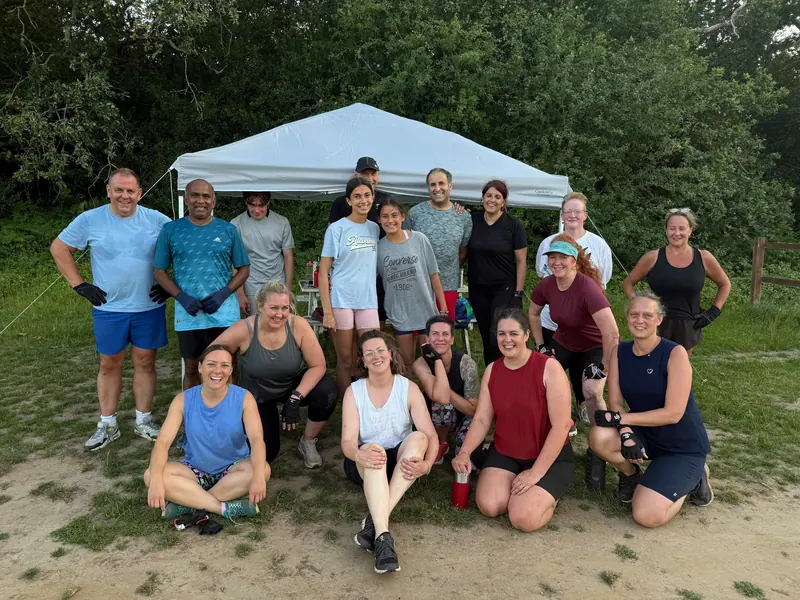 A mixed group of Bootcamp BR2 members in front of the gazebo after a summer evening session in Bromley